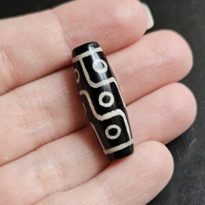 Бусина ДЗИ Девять глаз, размер 10х30 мм.